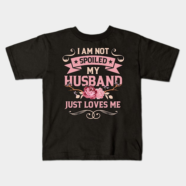 I am not spoiled. My husband just LOVES me! Kids T-Shirt by Antrobus